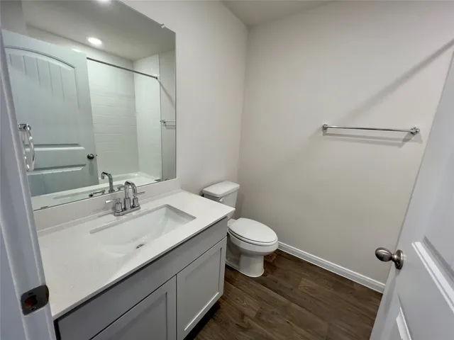 a bathroom with a bathtub a sink and a toilet