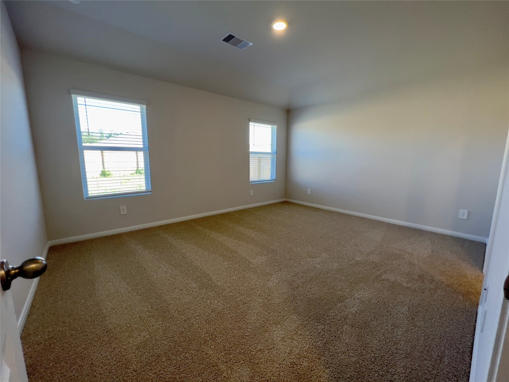 314 Addison Place Lockhart, TX 78644 - Photo 10 of 33 an empty room with a windows and closet