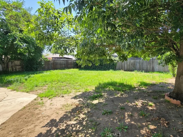 a view of swimming pool with a yard