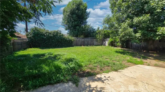 a view of a backyard with a garden