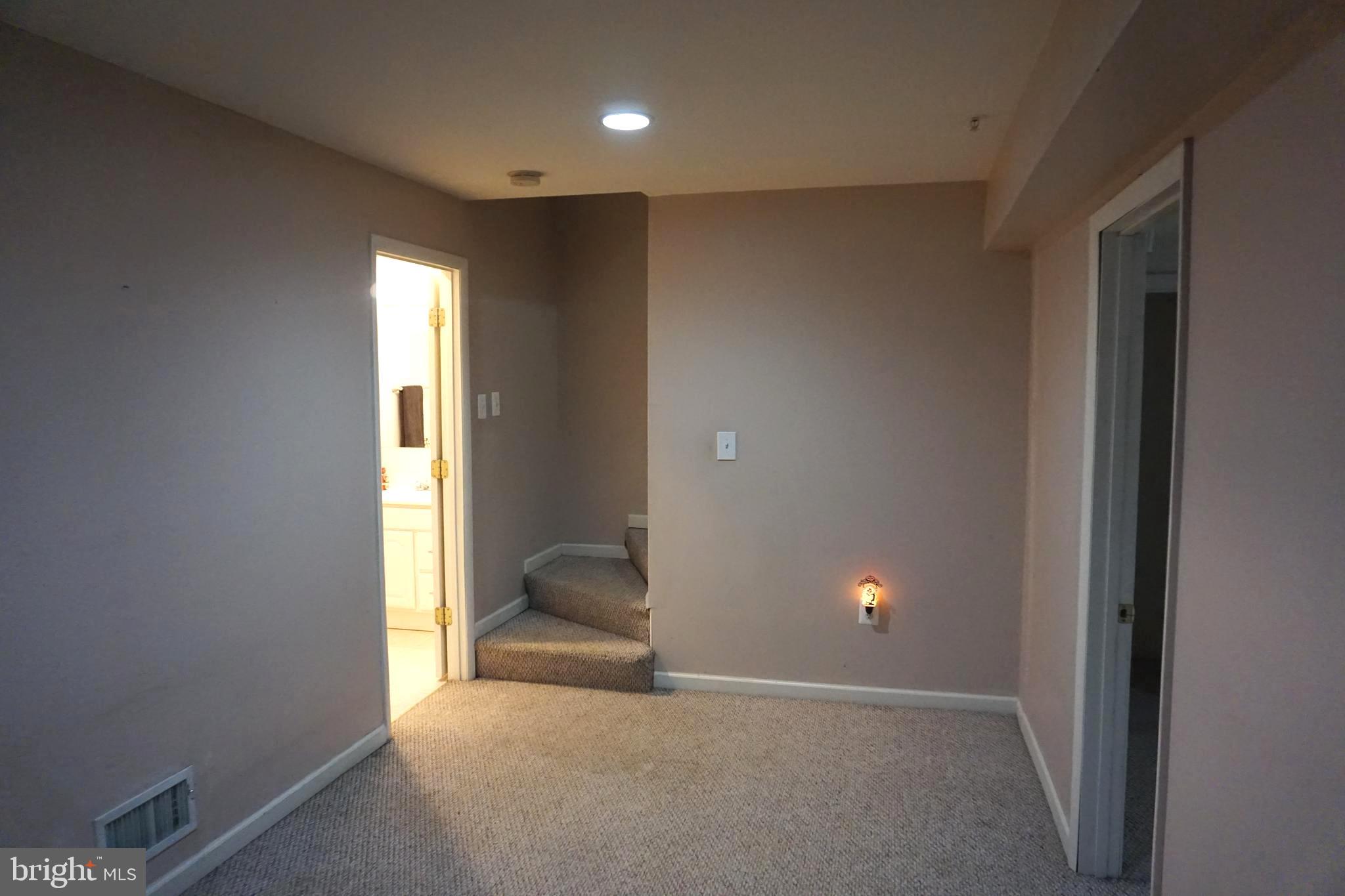 2006 Hackberry Road Essex, MD 21221 - Photo 41 of 55 Lower level room w/ Full Bath / laundry area's