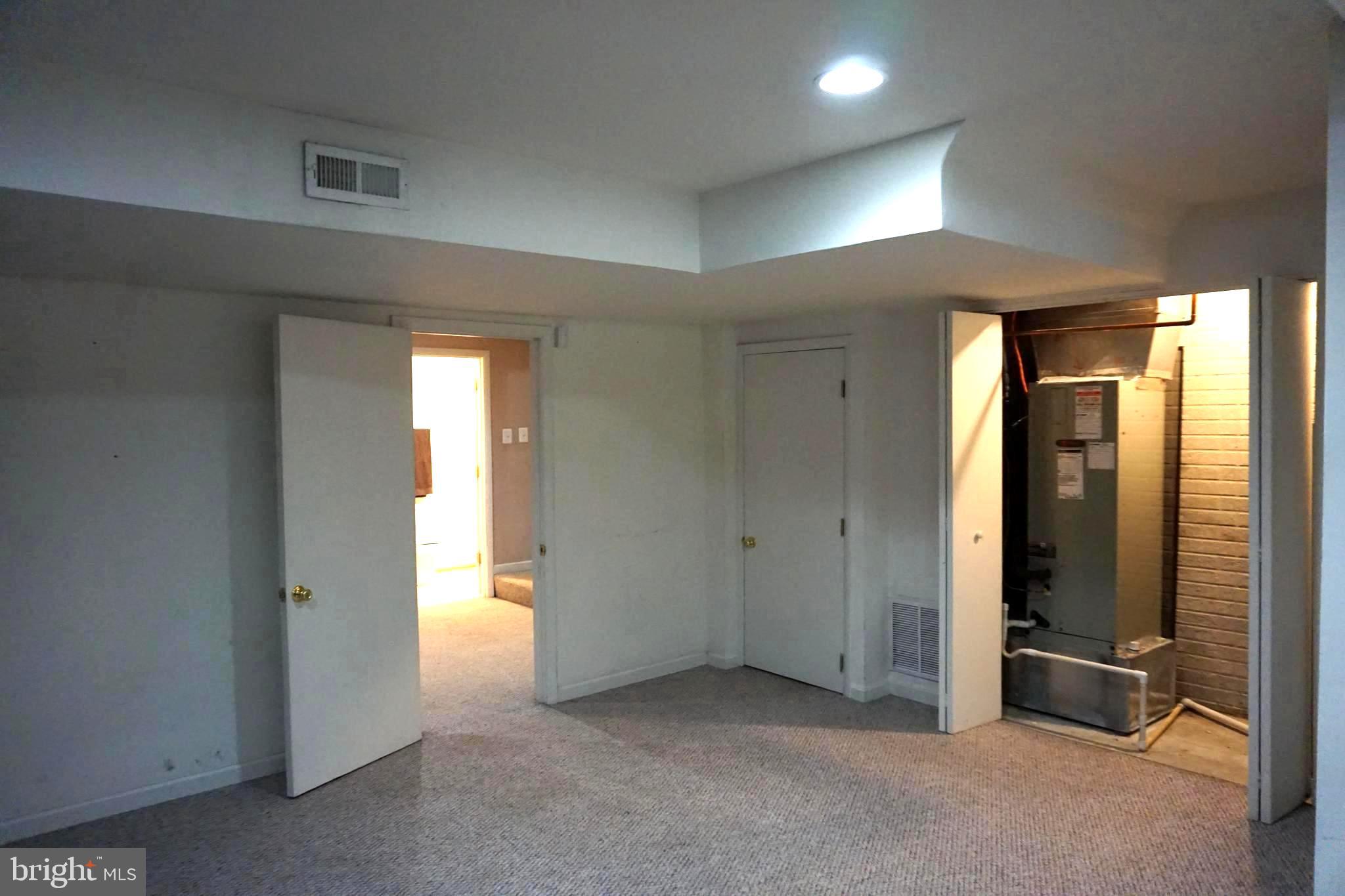 2006 Hackberry Road Essex, MD 21221 - Photo 46 of 55 Lower level large room w/ utility & storage space