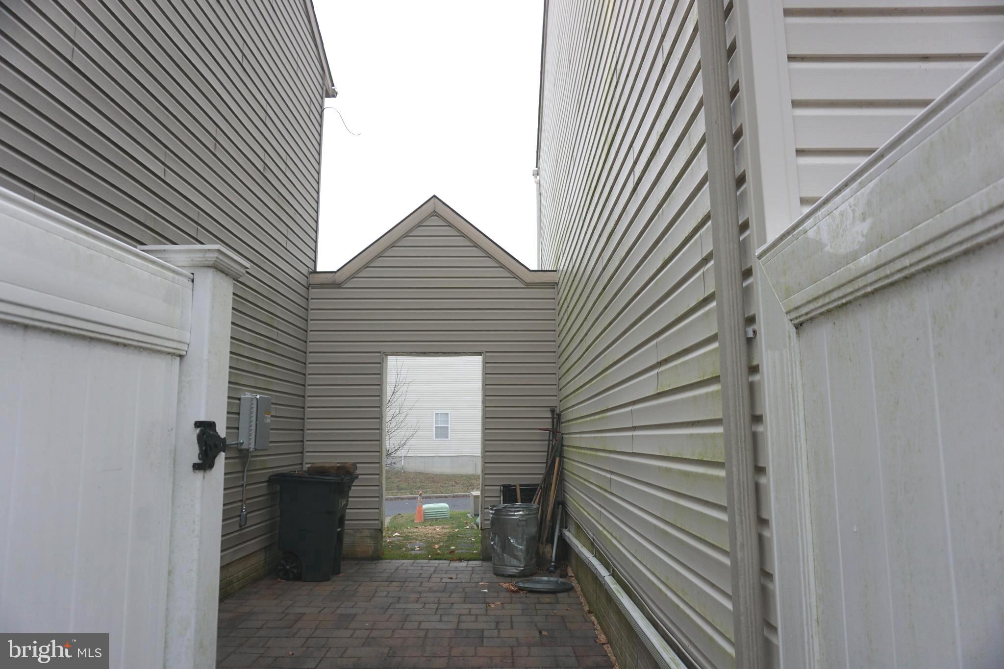 2006 Hackberry Road Essex, MD 21221 - Photo 55 of 55 Private alley way between both end of groups