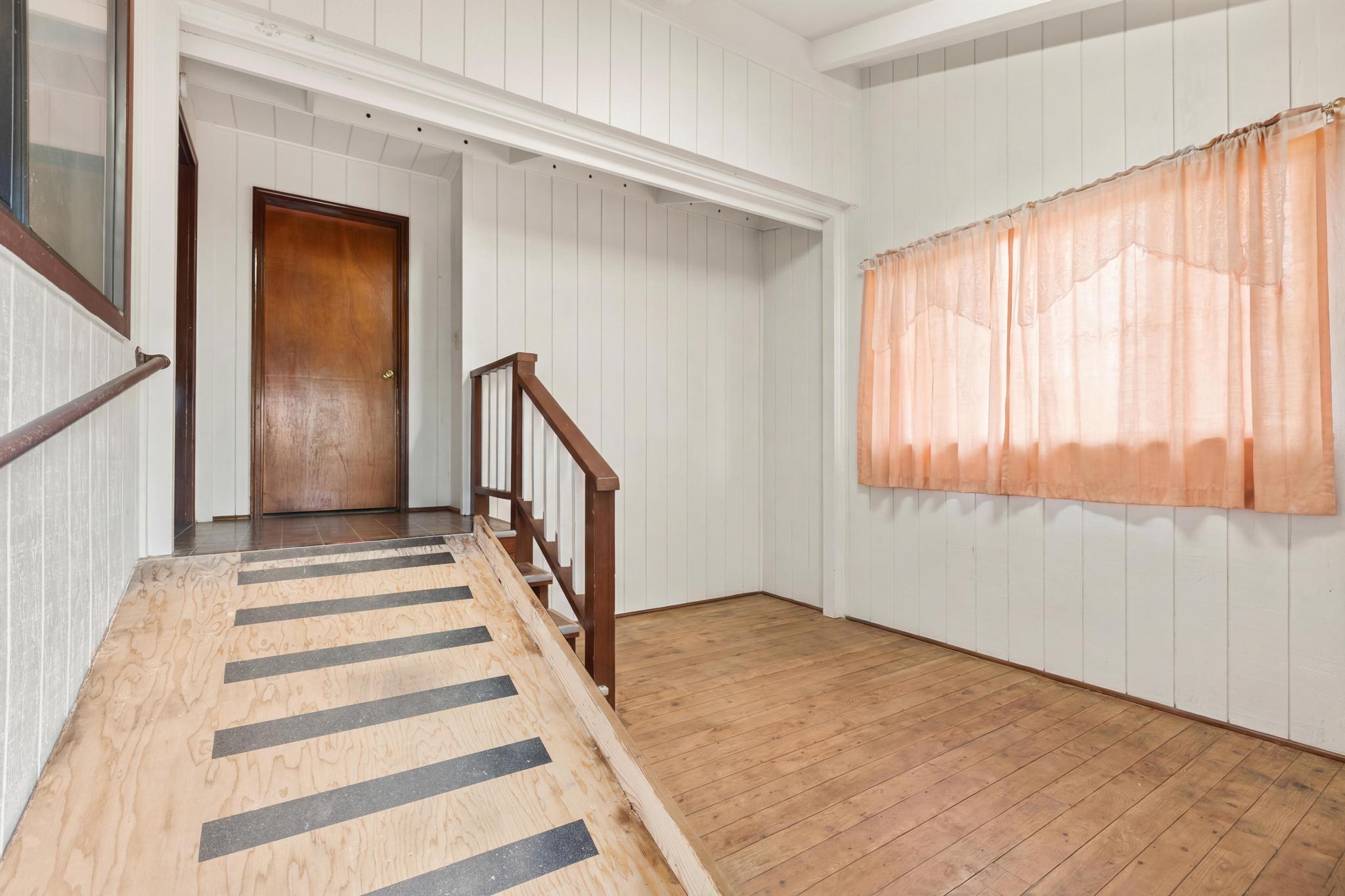54-382 Union Mill Road Kapaau, HI 96755 - Photo 13 of 28 a view of entryway with wooden floor and front door