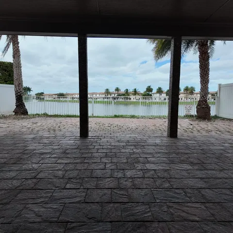 a view of a lake from a balcony