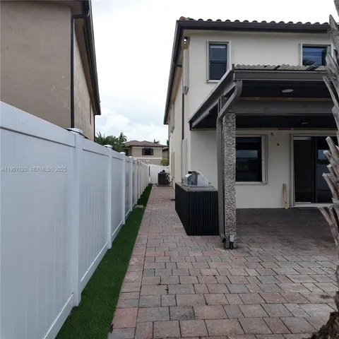 a house view with a garden space