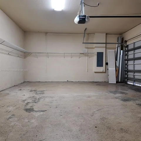 a view of a room with an empty space