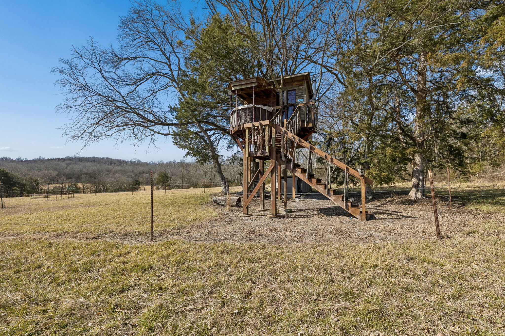935 Comer Road Lascassas, TN 37085 - Photo 21 of 77 a backyard of a house with lots of green space