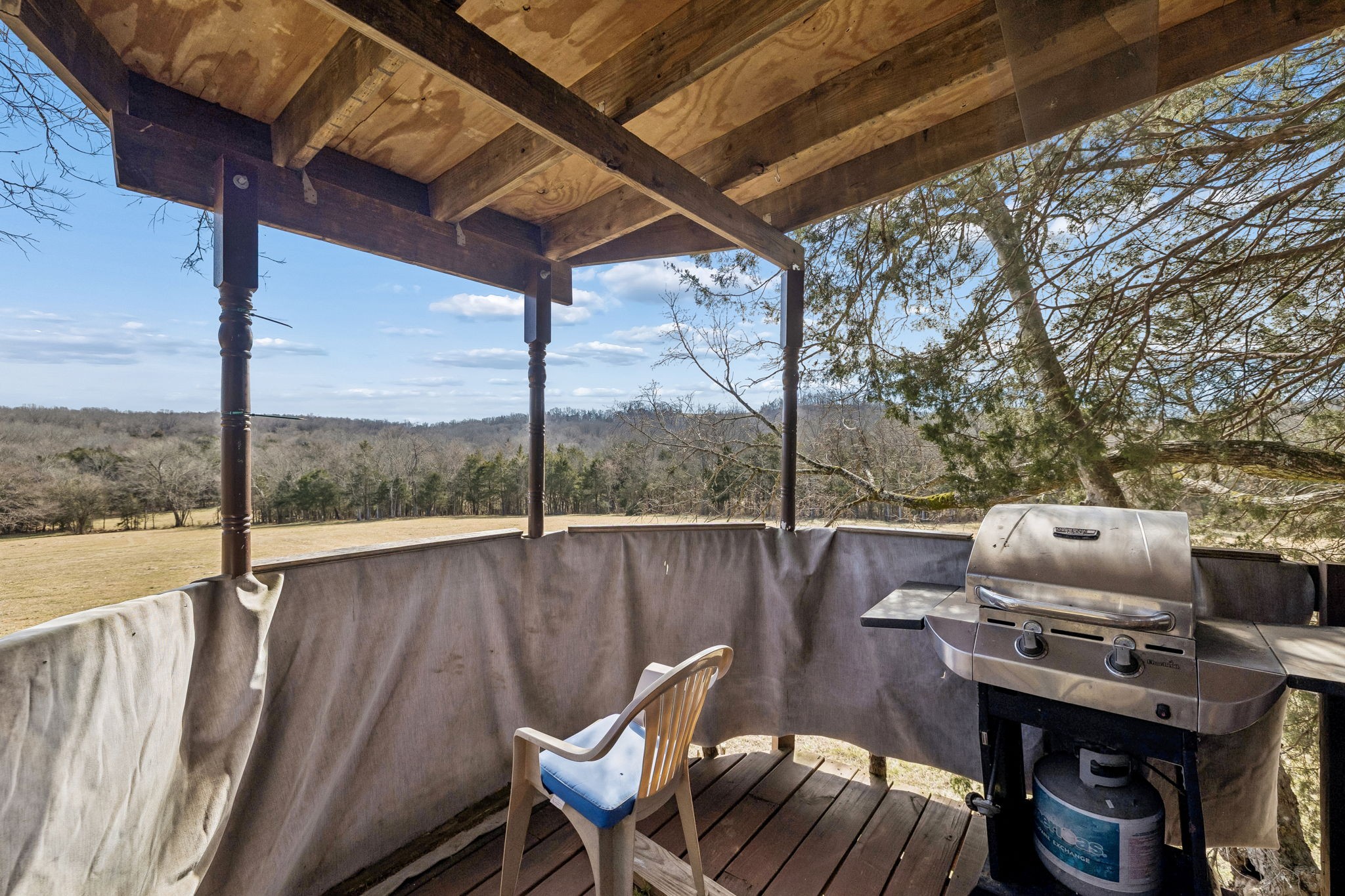 935 Comer Road Lascassas, TN 37085 - Photo 24 of 77 a view of a chairs and table in patio