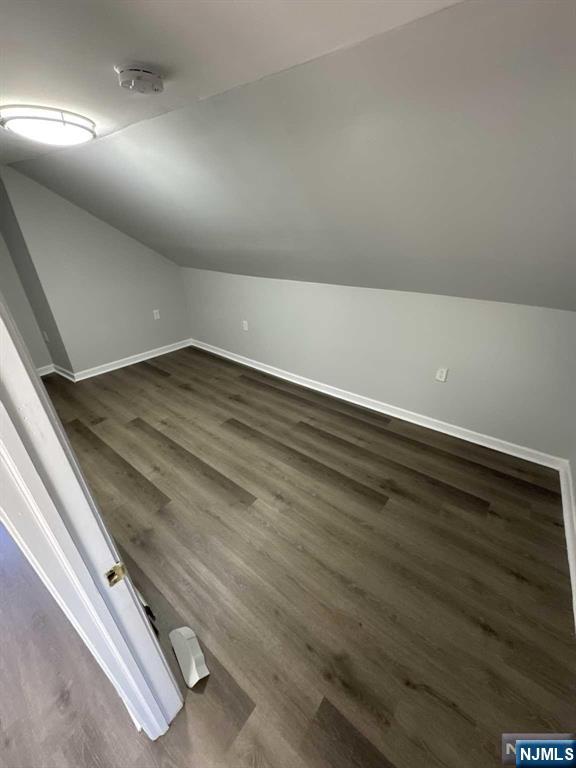 108 Madison Street Paterson, NJ 07501 - Photo 5 of 15 en empty room with wooden floor