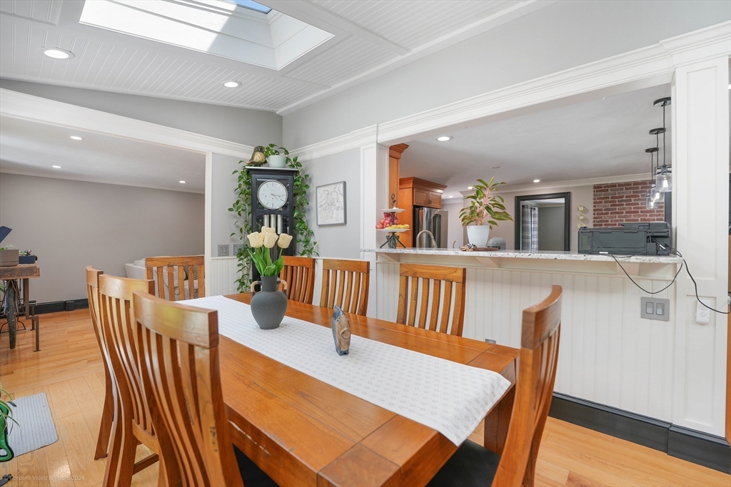 13 Gerrish Road Rochester, MA 02770 - Photo 7 of 30 a view of a dining room with furniture and wooden floor