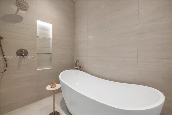 an aerial view of a house with a garden