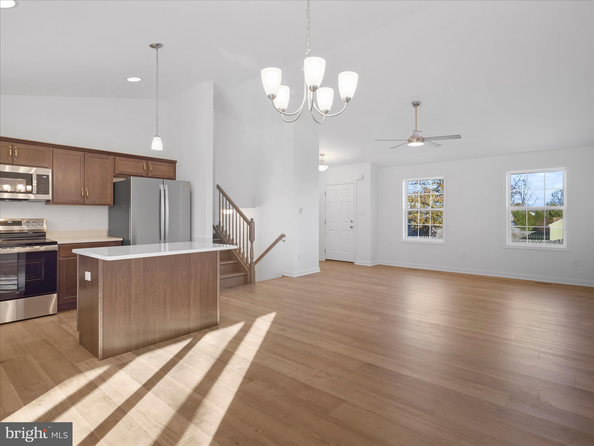 110 Hykes Road East Greencastle, PA 17225 - Photo 11 of 40 a view of kitchen with sink and wooden floor