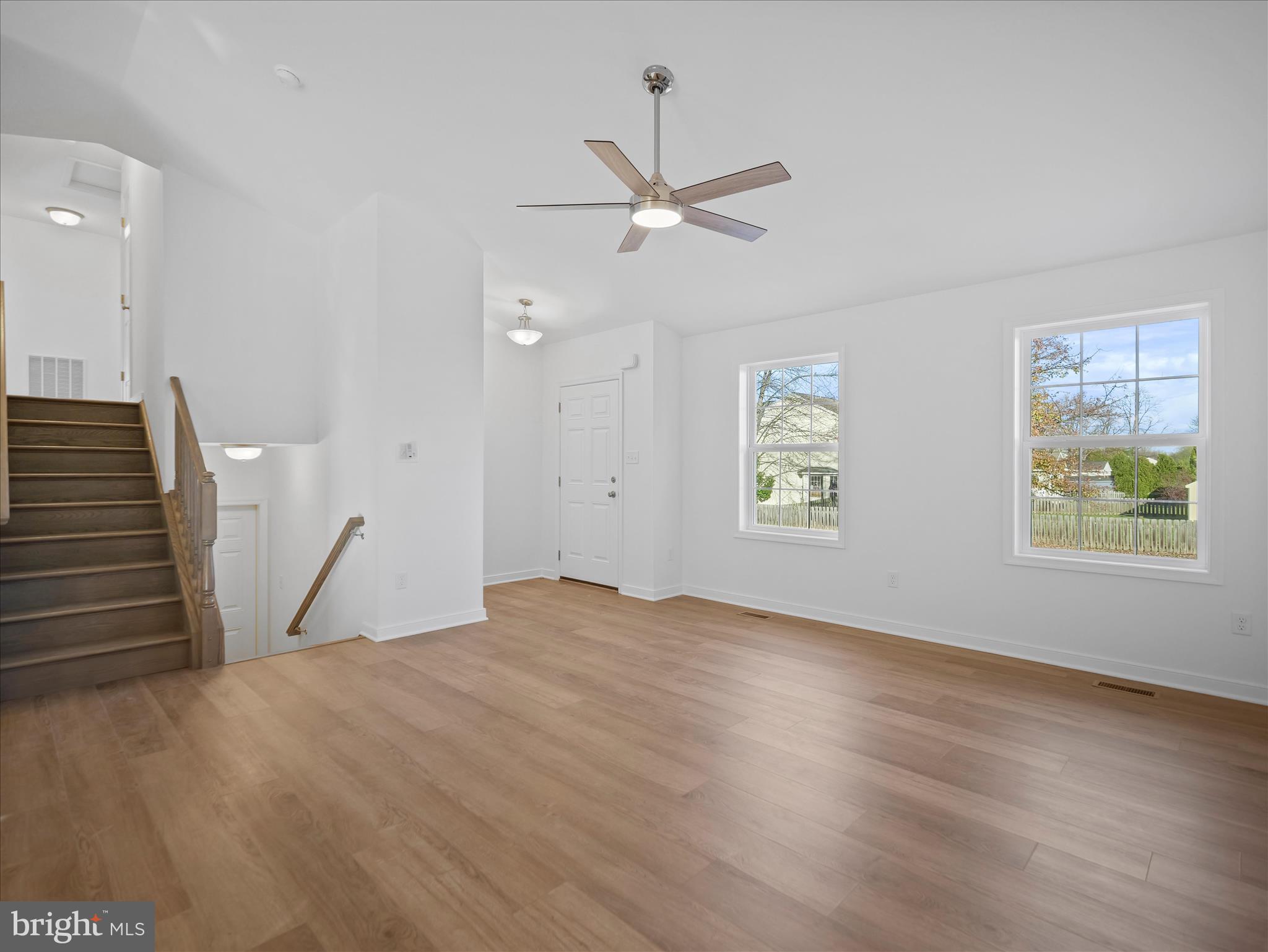 110 Hykes Road East Greencastle, PA 17225 - Photo 20 of 40 a view of an empty room with wooden floor and a window