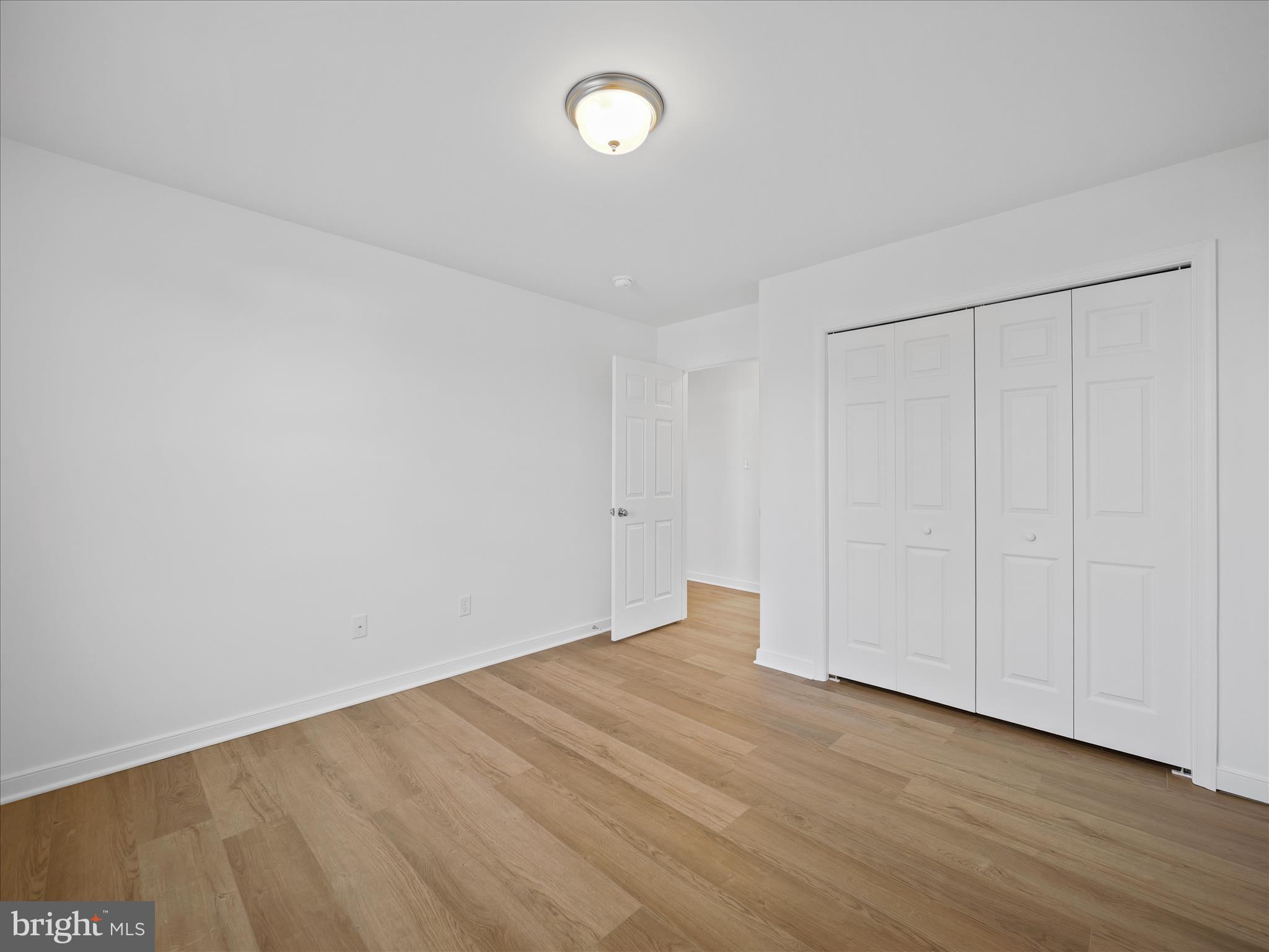 110 Hykes Road East Greencastle, PA 17225 - Photo 23 of 40 a view of an empty room with wooden floor
