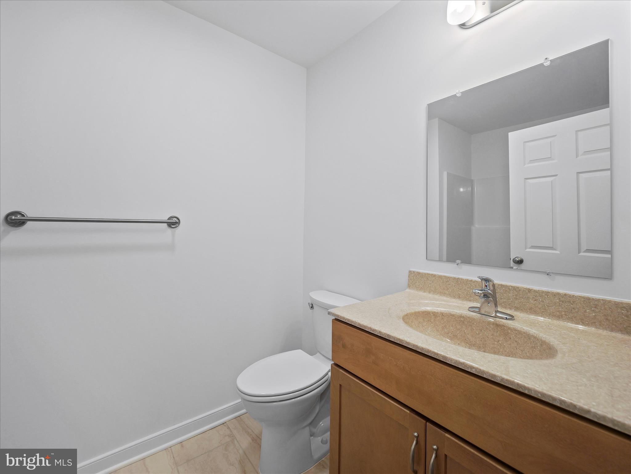 110 Hykes Road East Greencastle, PA 17225 - Photo 25 of 40 a bathroom with a sink toilet and vanity