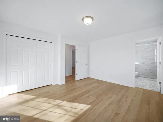 a bathroom with a sink toilet and vanity