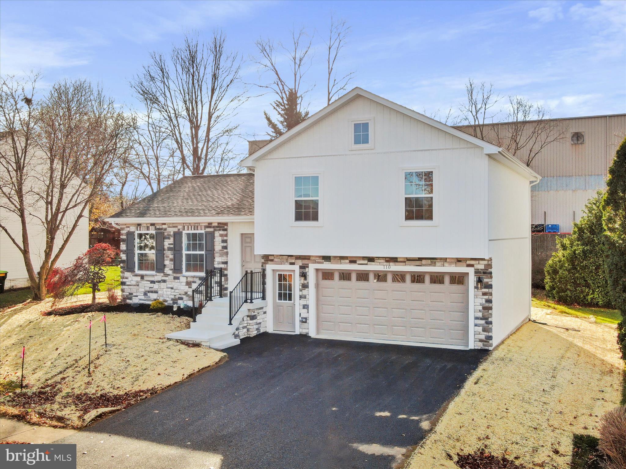 110 Hykes Road East Greencastle, PA 17225 - Photo 4 of 40 a front view of a house with a yard