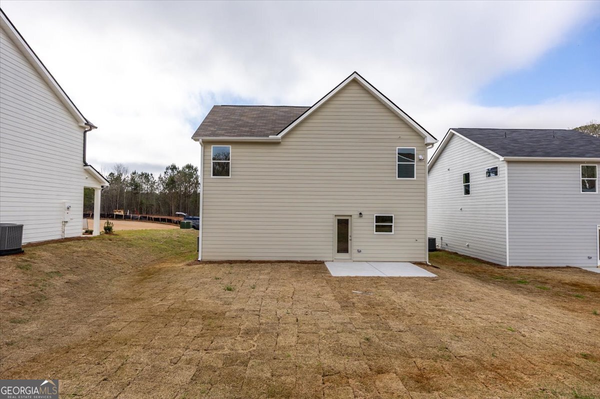 5 Morningside Court Thomaston, GA 30286 - Photo 24 of 26 a view of a house with yard and garage