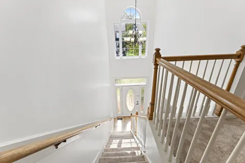 a bedroom with a bed and dresser