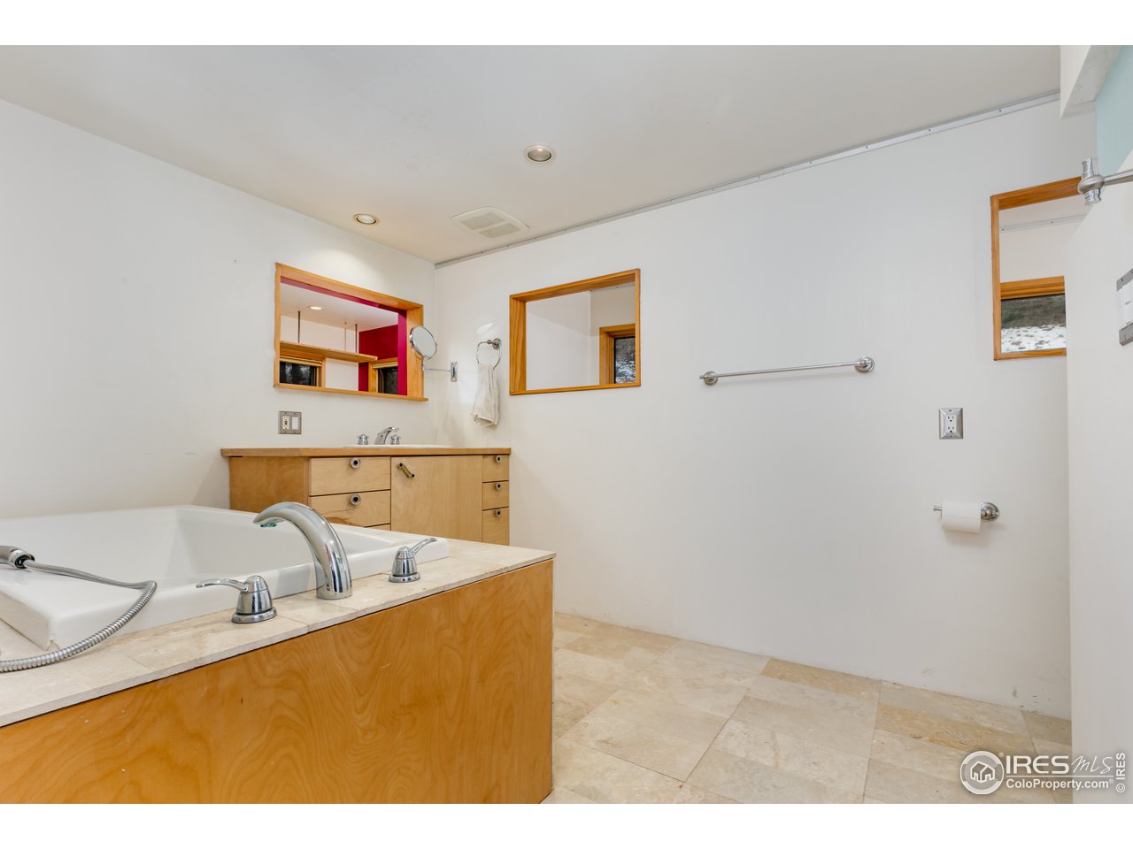 12 Dime Road Boulder, CO 80302 - Photo 19 of 28 a bathroom with a sink and a bathtub