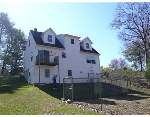 95 Columbia Heights Road Charlestown, RI 02813 - Photo 2 of 7 Exterior Back.