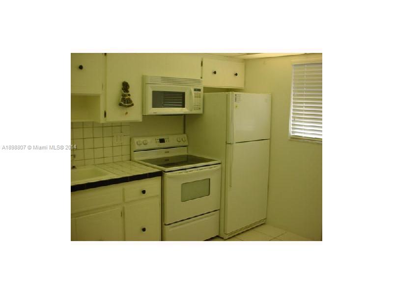 17900 North Bay Road, Unit PH3 Sunny Isles Beach, FL 33160 - Photo 12 of 18 a bathroom with a sink shower and a mirror