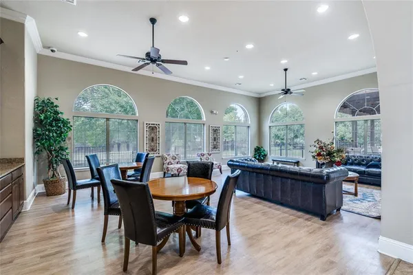a view of a dining room with furniture window and outside view