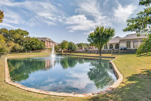 a view of a lake in front of house