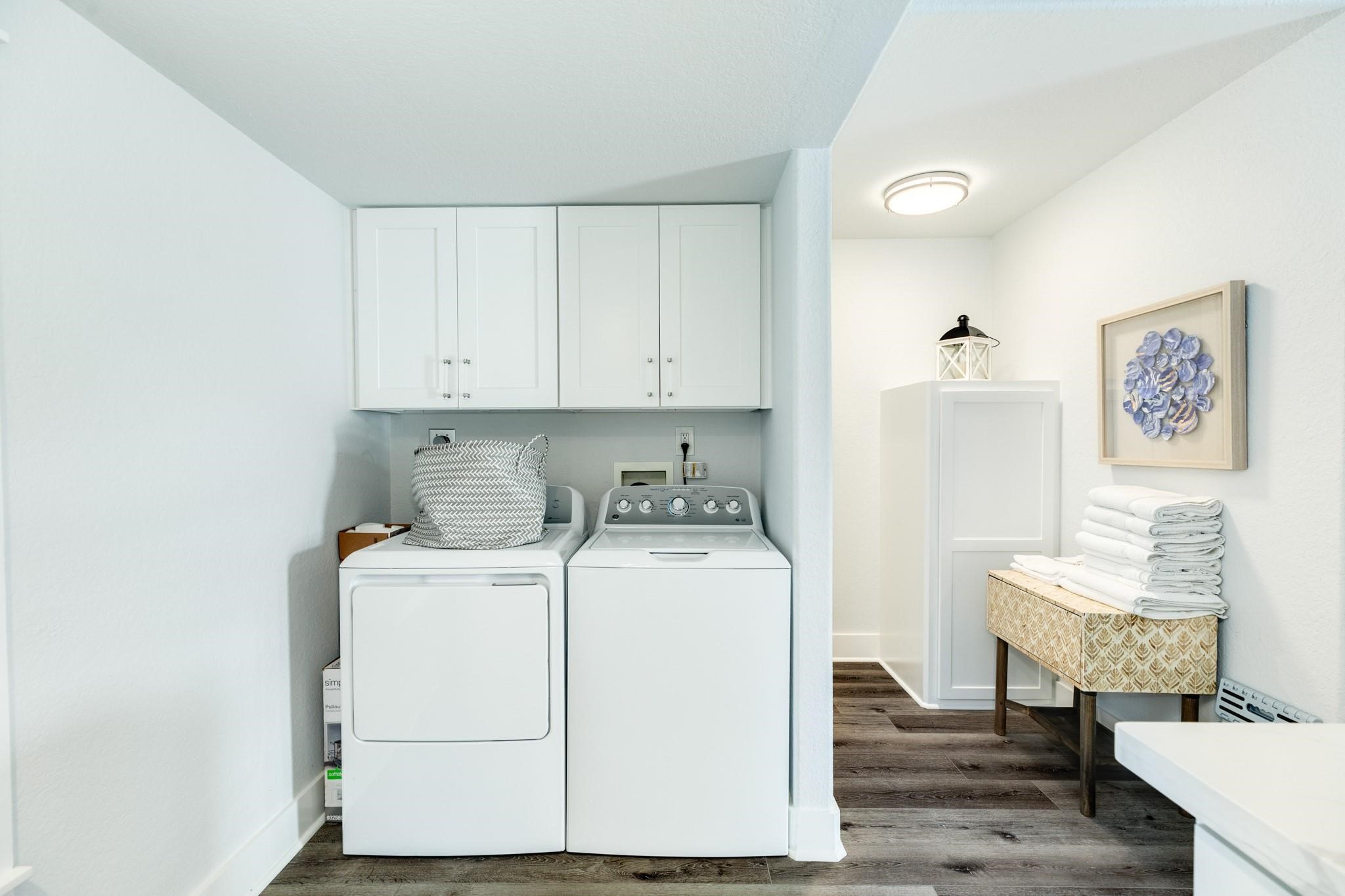 307 Angel Wing Street Surfside Beach, TX 77541 - Photo 14 of 23 a view of a storage and utility room with washer and dryer