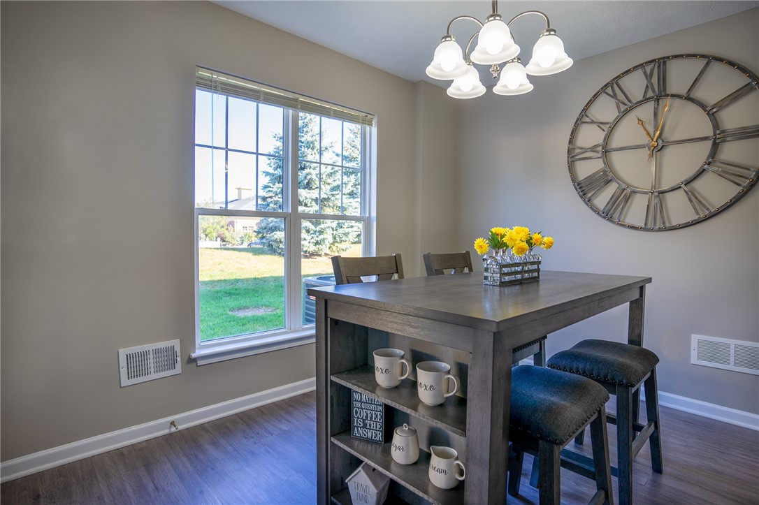 774 Royal Sunset Drive Webster, NY 14580 - Photo 6 of 14 View of typical dining area of great room. Door to