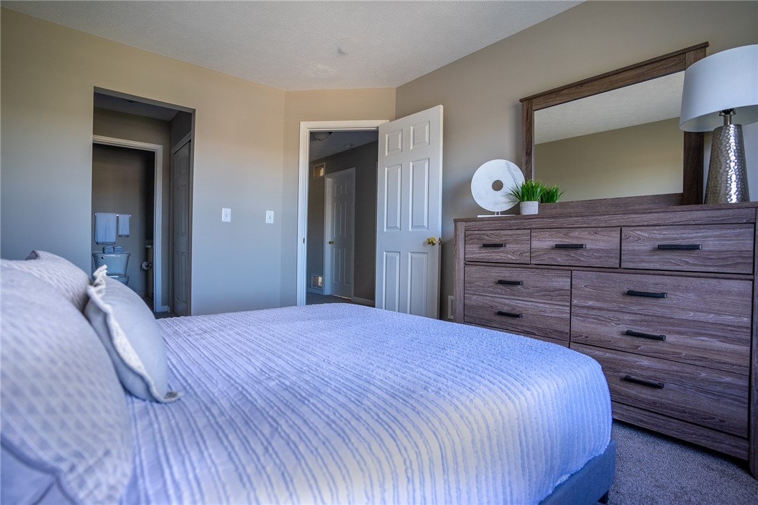 774 Royal Sunset Drive Webster, NY 14580 - Photo 8 of 14 Typical second floor primary bedroom with view to