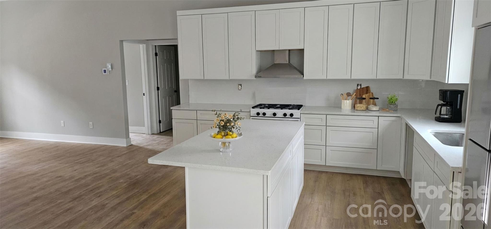 308 Zion Church Road Clover, SC 29710 - Photo 13 of 21 a kitchen with stainless steel appliances granite countertop a sink stove and cabinets