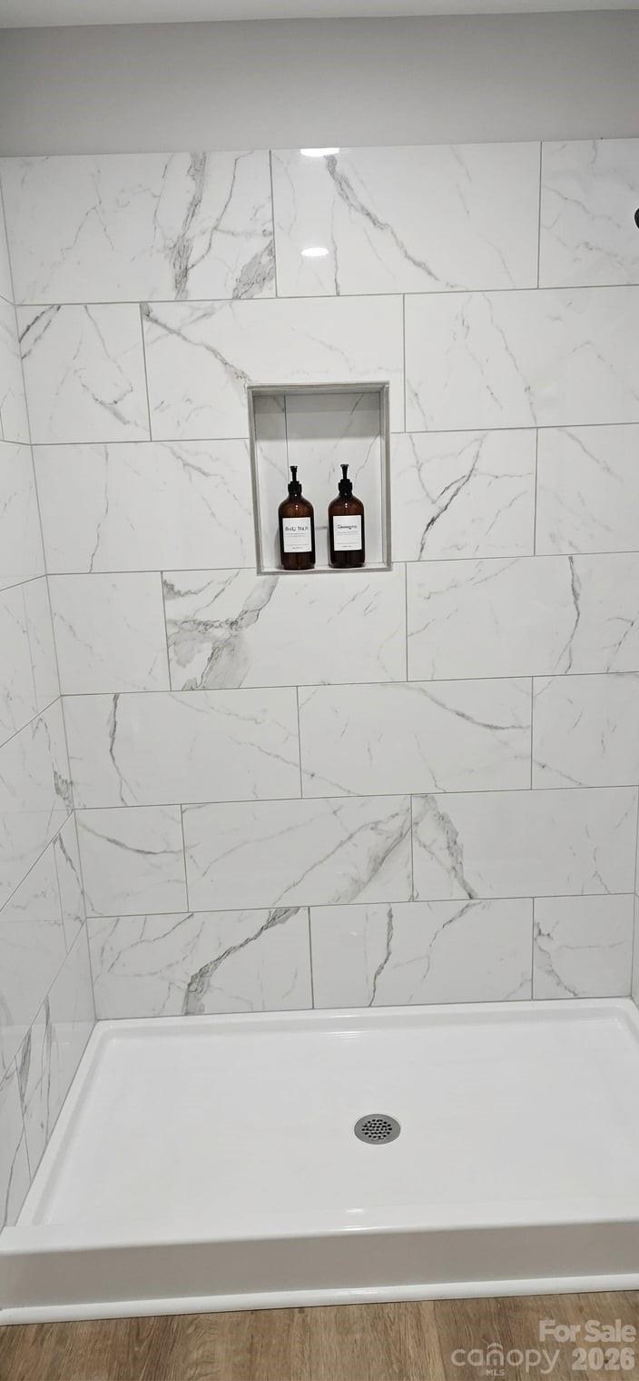 308 Zion Church Road Clover, SC 29710 - Photo 20 of 21 a bathroom with a bathtub and shower