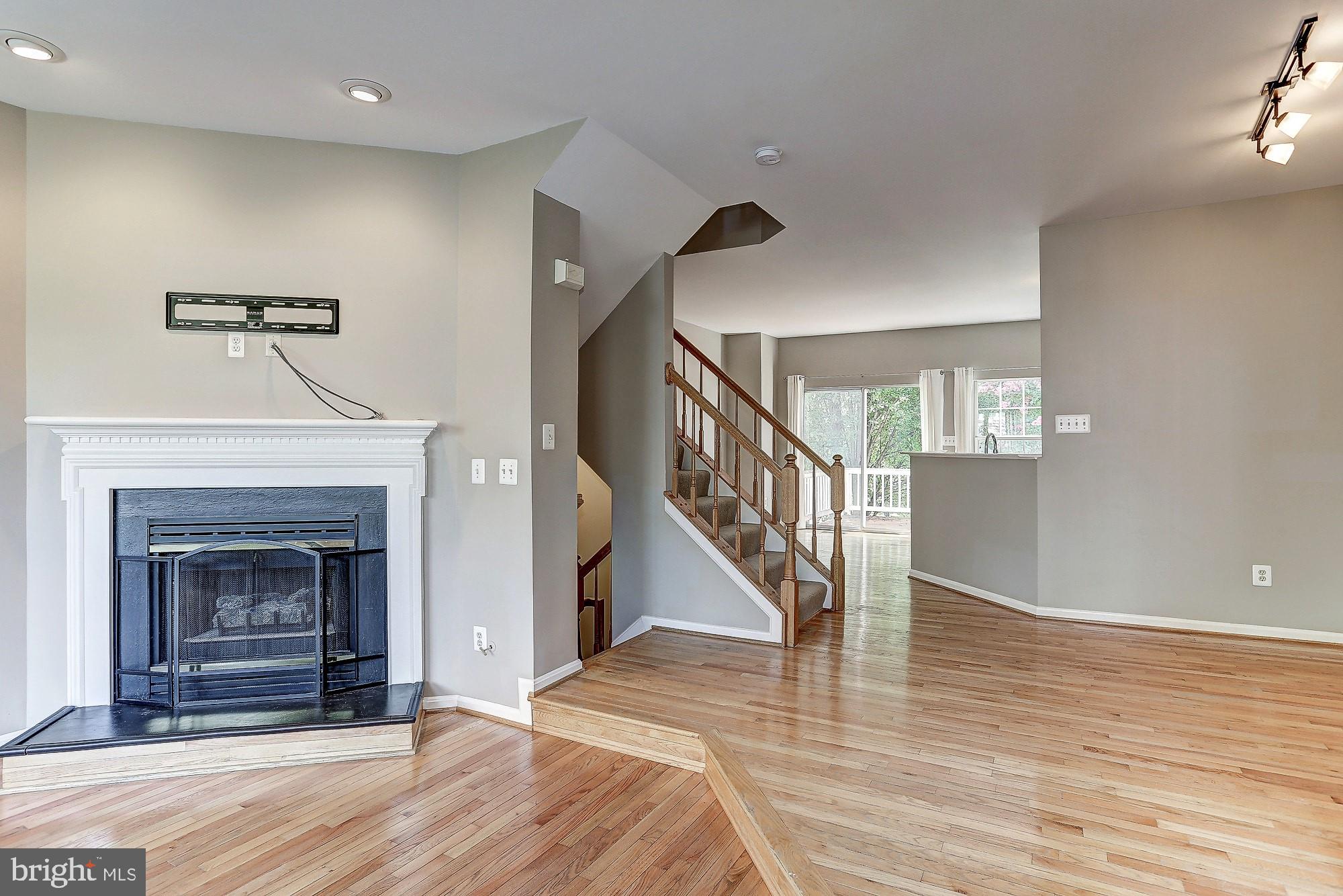 12011 Edgemere Circle Reston, VA 20190 - Photo 9 of 29 LIVING ROOM W/ GAS FIREPLACE