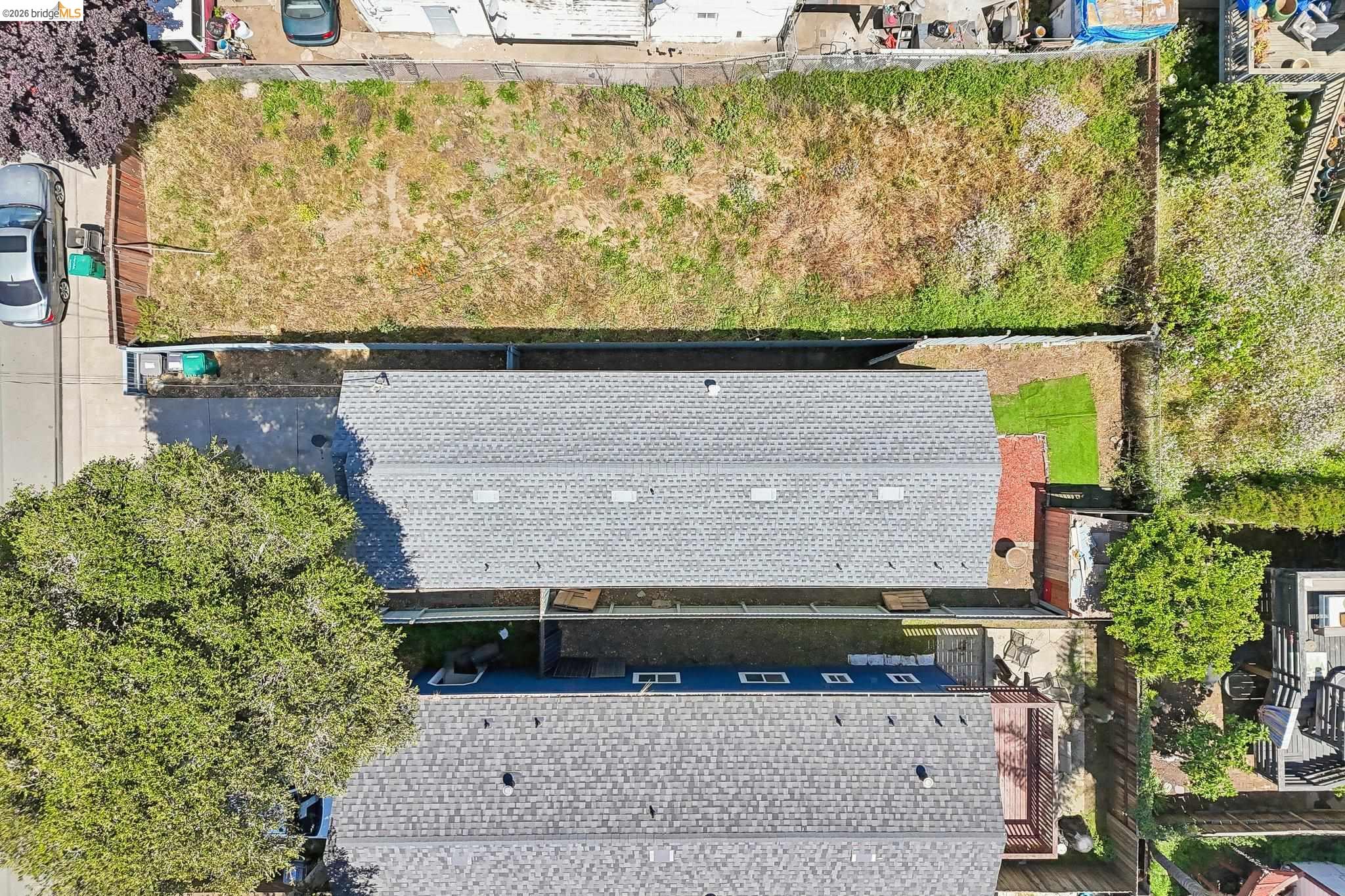 874 Pine Street Oakland, CA 94607 - Photo 38 of 39 Expansive rear yard area featuring a combination of natural ground cover and fenced perimeter