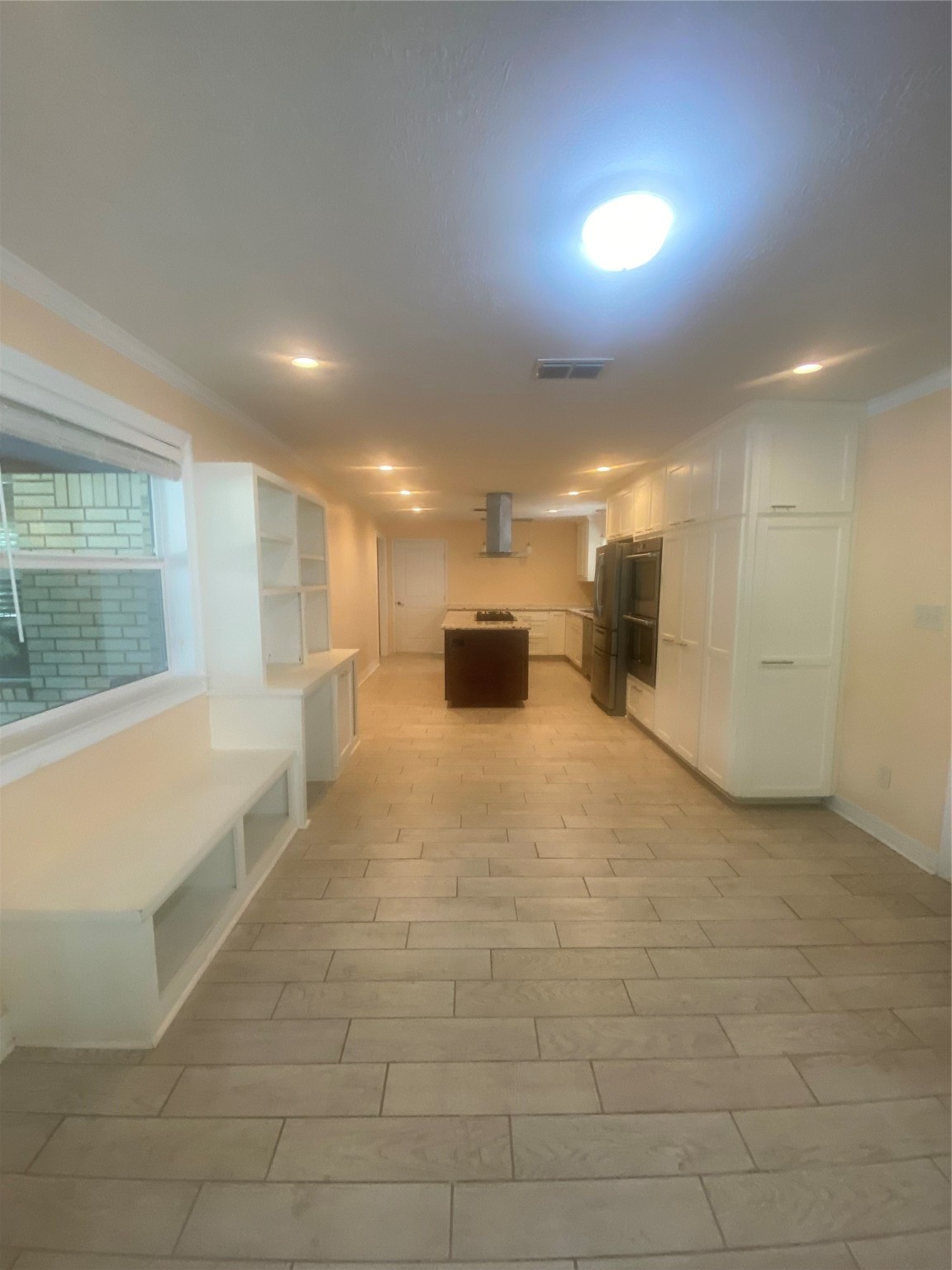 609 Kerr Street Brenham, TX 77833 - Photo 11 of 34 a view of an empty room with a window