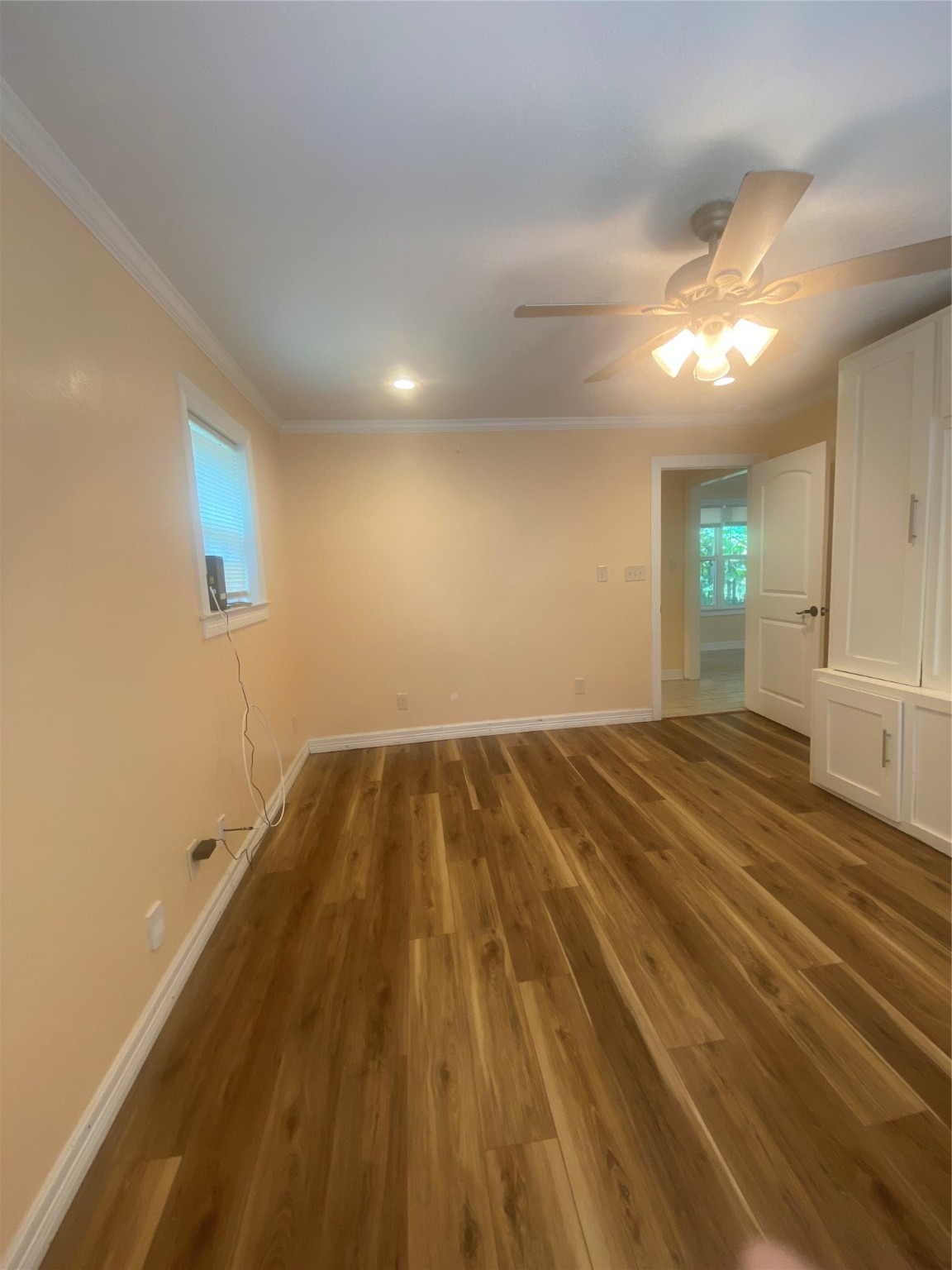 609 Kerr Street Brenham, TX 77833 - Photo 14 of 34 a view of empty room with wooden floor