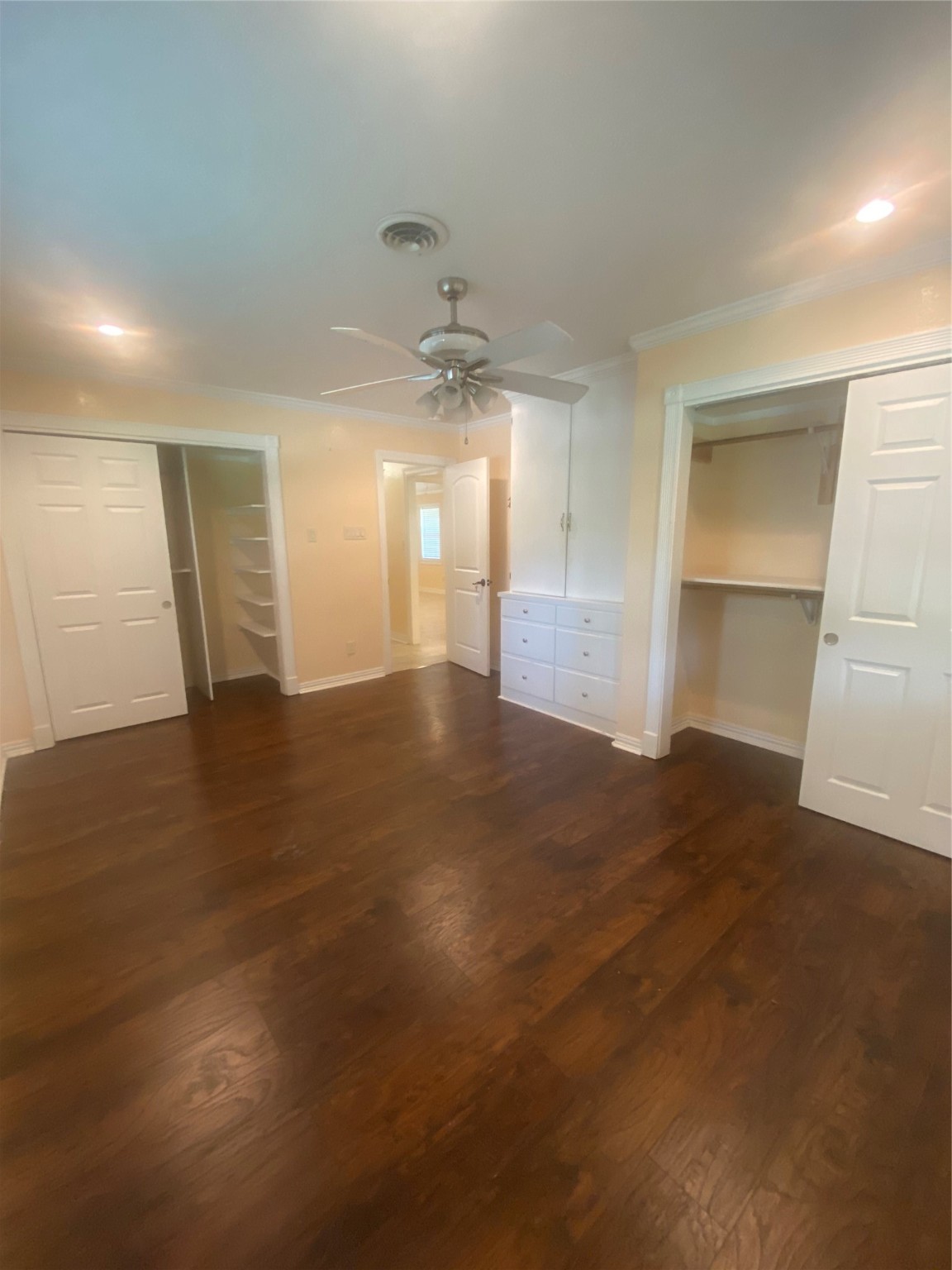 609 Kerr Street Brenham, TX 77833 - Photo 20 of 34 an empty room with wooden floor and windows