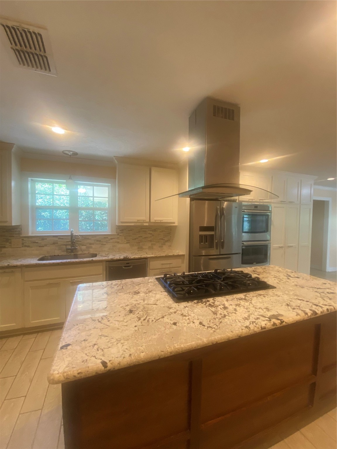 609 Kerr Street Brenham, TX 77833 - Photo 10 of 34 a bathroom with a granite countertop sink and a large mirror