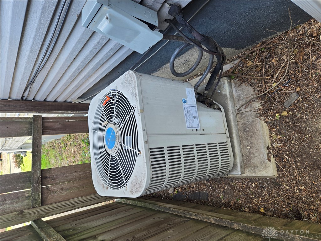 355 Elmhurst Road Dayton, OH 45417 - Photo 6 of 19 Essential cooling unit provides reliable comfort for the entire property.