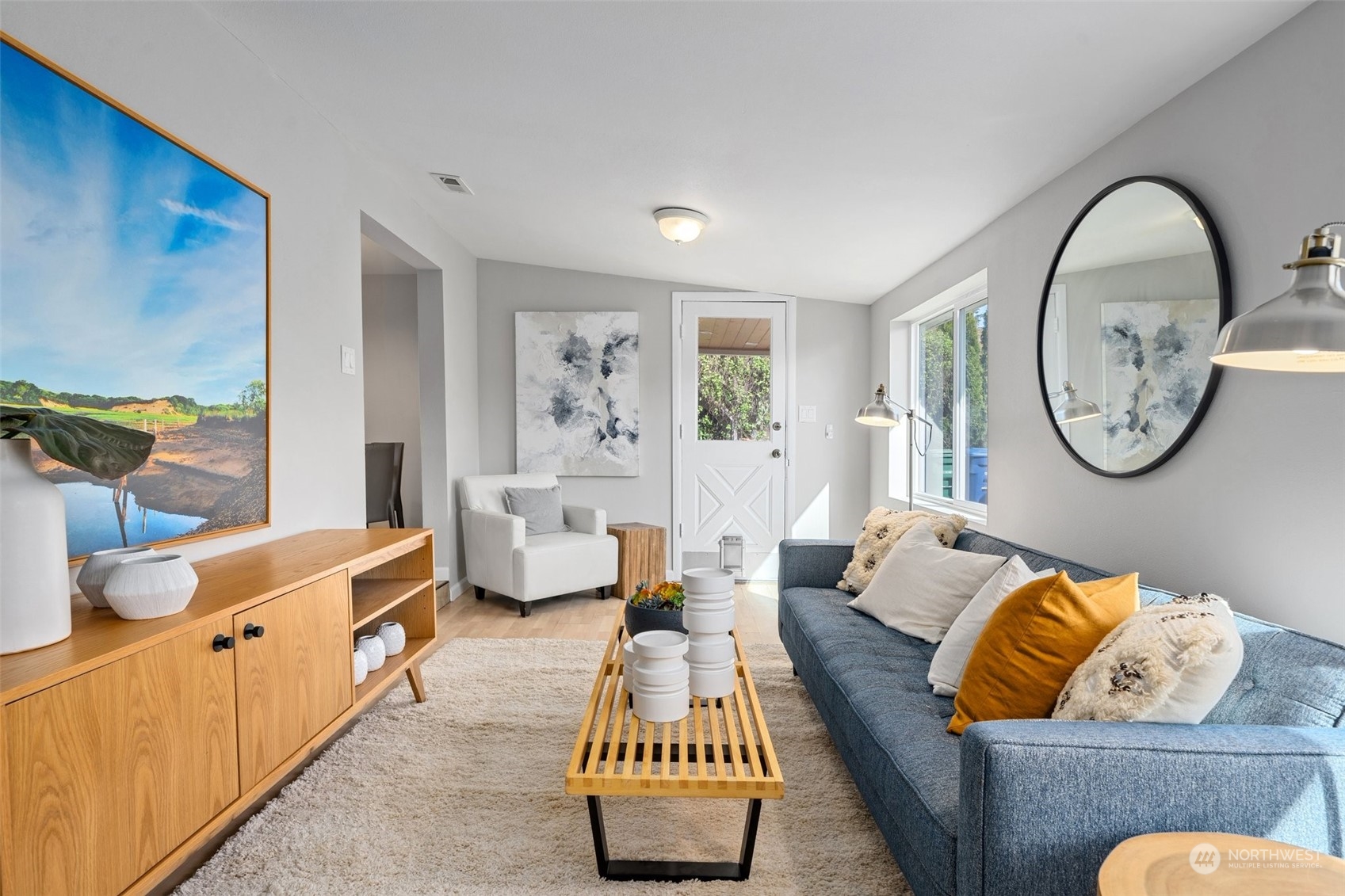 12645 Southeast 170th Street Renton, WA 98058 - Photo 13 of 37 a living room with furniture a mirror and a window