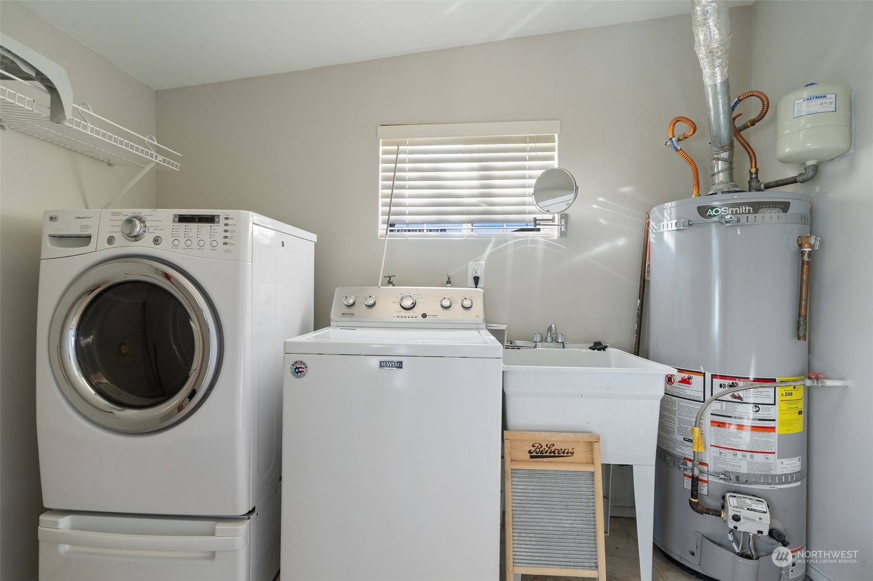12645 Southeast 170th Street Renton, WA 98058 - Photo 14 of 37 a utility room with dryer and washer