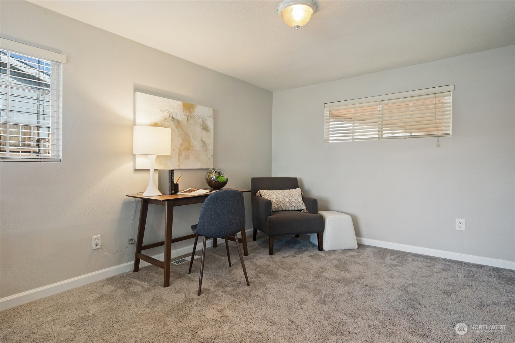 12645 Southeast 170th Street Renton, WA 98058 - Photo 17 of 37 a view of a workspace with furniture and a window