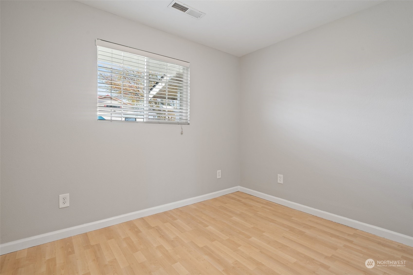 12645 Southeast 170th Street Renton, WA 98058 - Photo 22 of 37 an empty room with a window