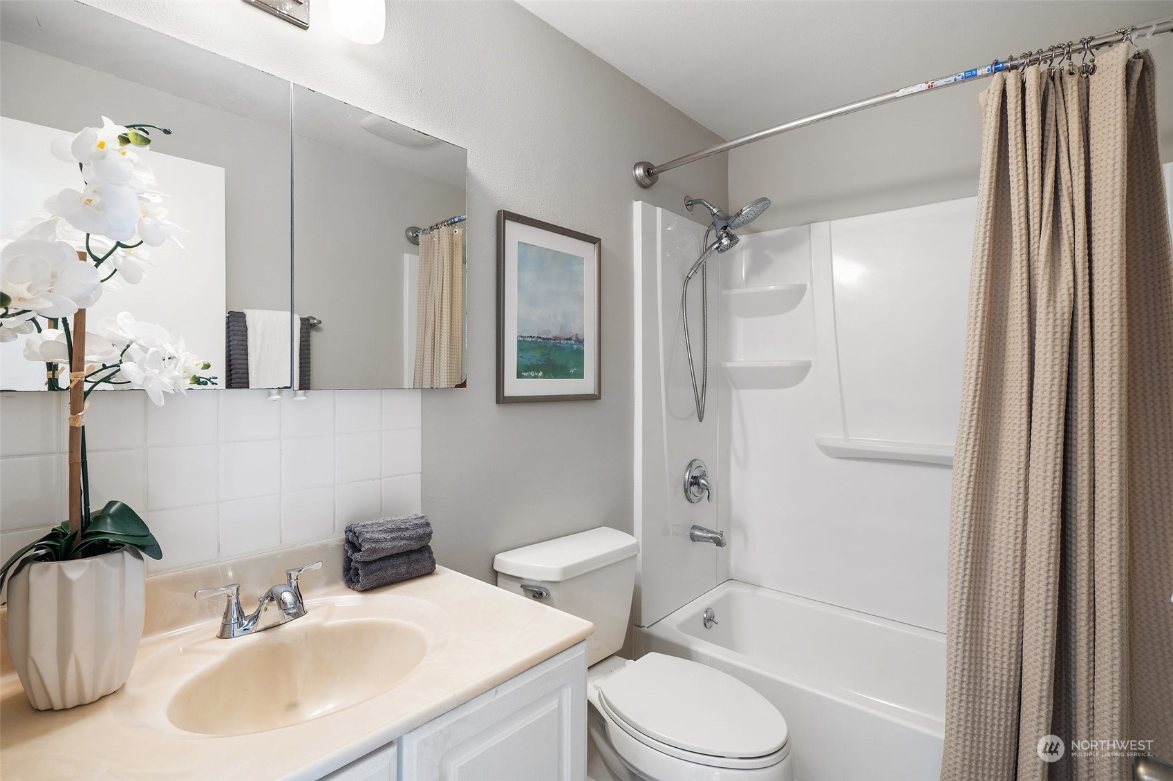 12645 Southeast 170th Street Renton, WA 98058 - Photo 23 of 37 a bathroom with a sink toilet and shower
