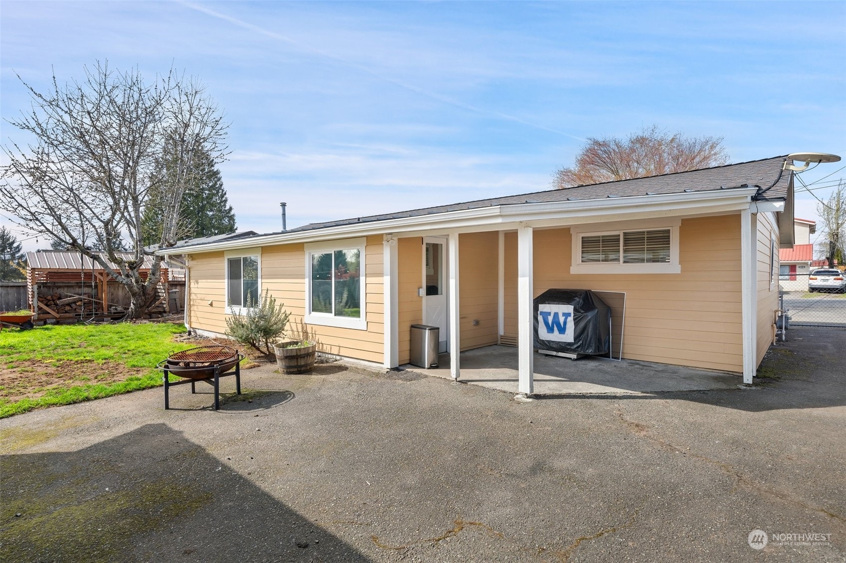 12645 Southeast 170th Street Renton, WA 98058 - Photo 28 of 37 a view of a house with backyard porch and garden
