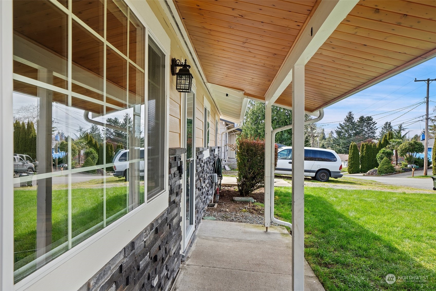 12645 Southeast 170th Street Renton, WA 98058 - Photo 3 of 37 a view of a patio with table and chairs and potted plants