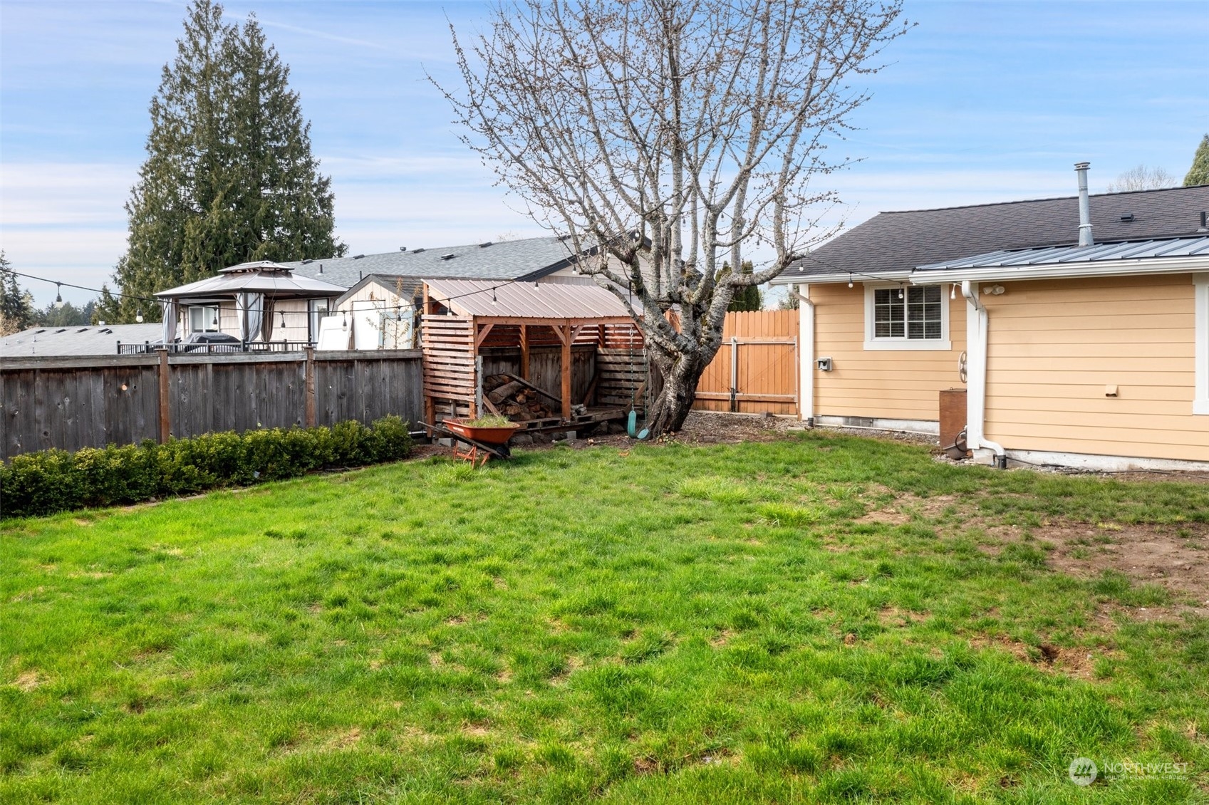 12645 Southeast 170th Street Renton, WA 98058 - Photo 31 of 37 a front view of a house with a yard