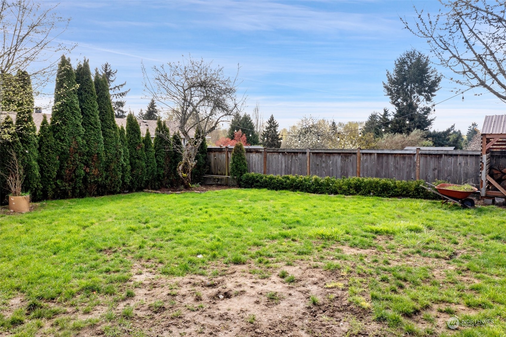 12645 Southeast 170th Street Renton, WA 98058 - Photo 32 of 37 a backyard of a house with lots of green space